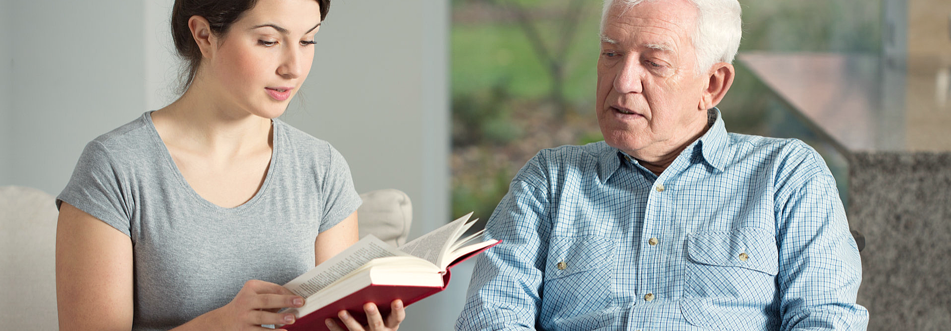 caregiver and elder reading bible